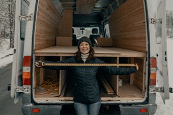 Woman in front of a truck