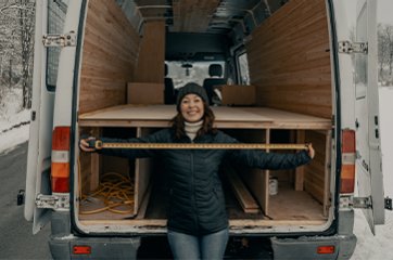 Woman in front of a truck