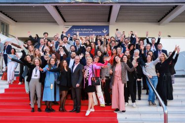 The whole MIPIM team standing on Palais des festivals' steps